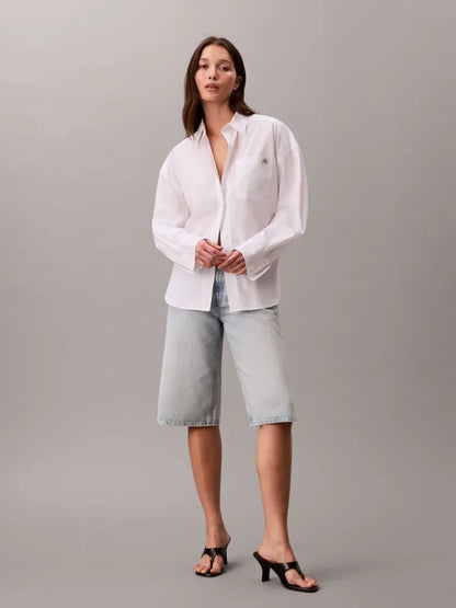 Camicia corta in popeline con monologo intessuto