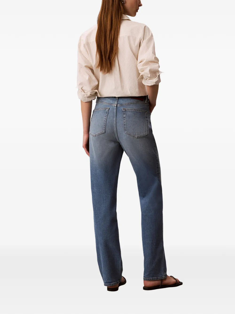 Jeans con baffatura