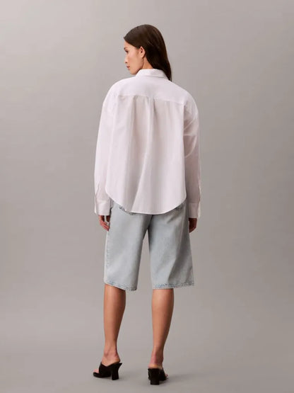 Camicia corta in popeline con monologo intessuto