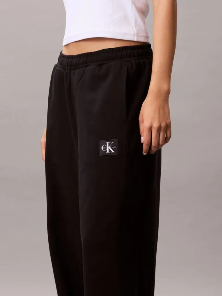 Pantaloni della tuta in spugna francese con monologo intessuto