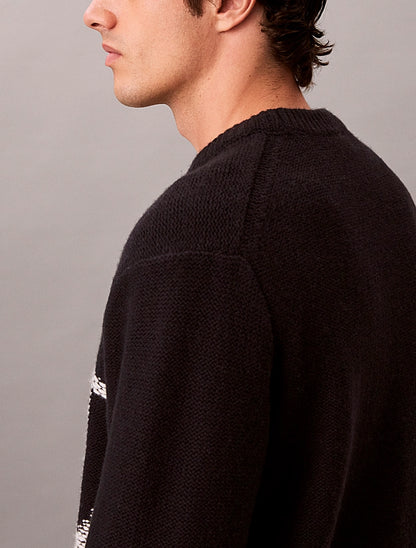 Maglione con monogramma in pura lana